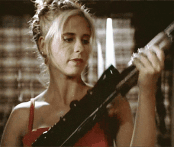 Gif of Buffy The Vampire Slayer cocking a shot gun.
