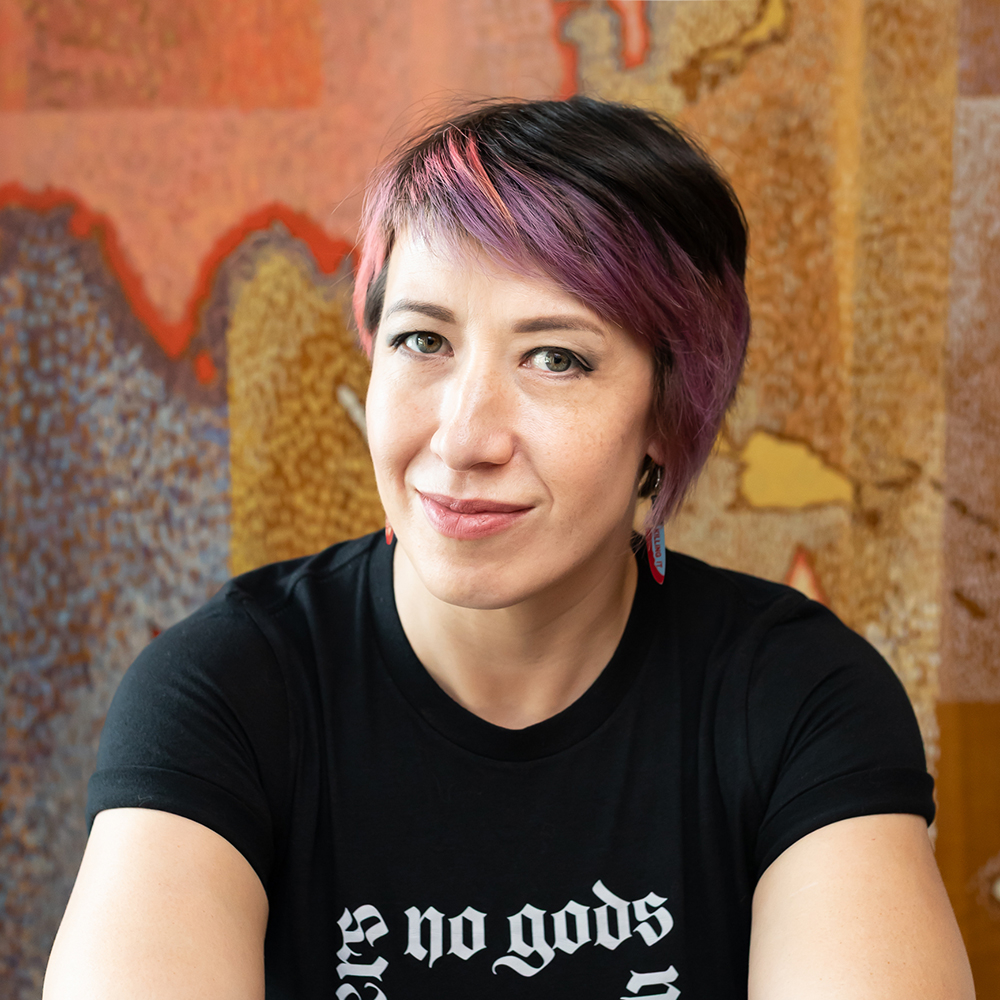 Sarah Giffrow - Creative Director + Benevolent Overlord (she/they)