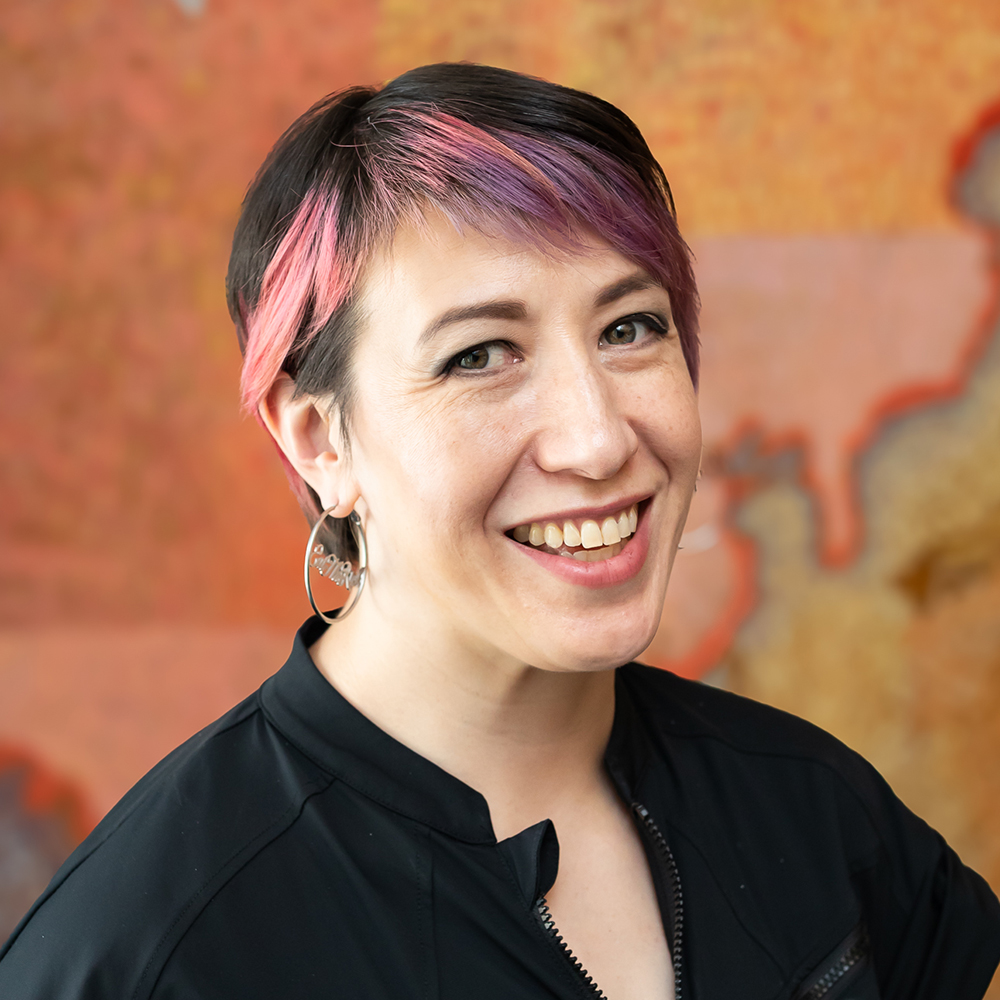 Sarah Giffrow - Creative Director + Benevolent Overlord (she/they)